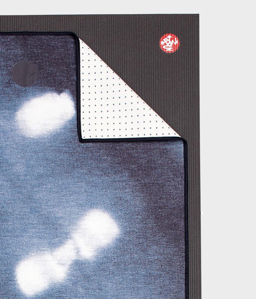 Manduka Yogitoes Mat Towel - Tie Dye Splash - lying flat, corner folded over | Manduka NZ
