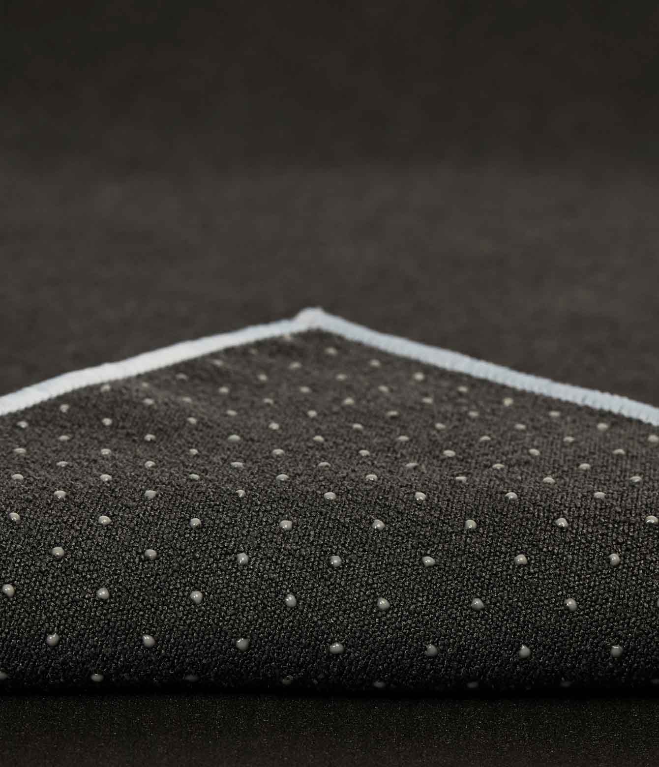 Manduka Yogitoes Mat Towel - Grey - corner folded over showing underside | Manduka NZ