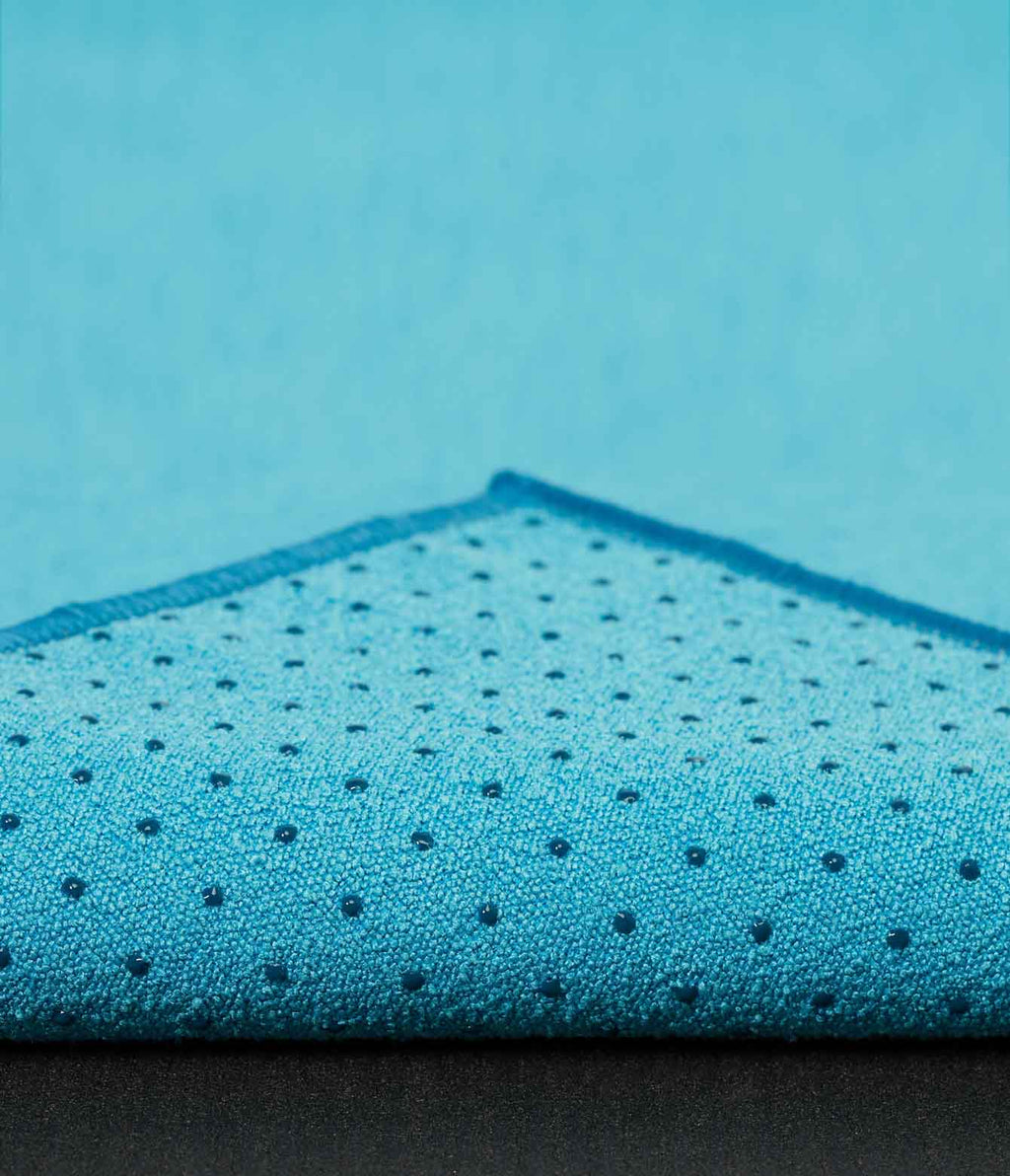 Manduka Yogitoes Mat Towel - Turquoise - corner folded over showing underside | Manduka NZ