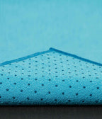 Manduka Yogitoes Mat Towel - Turquoise - corner folded over showing underside | Manduka NZ